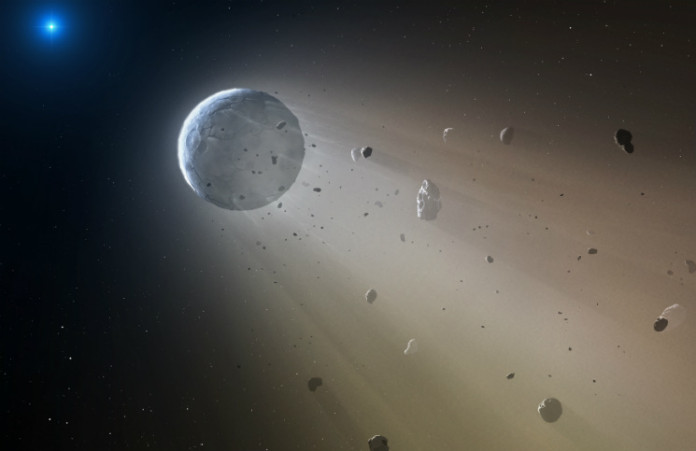 Asteroid nebo menší planeta u bílého trpaslíka v představách malíře. Credit: CfA/Mark A. Garlick