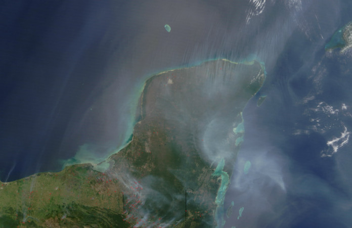 Poloostrov Yucatán ukrývá důkaz dávné globální katastrofy. Zdroj: NASA (eoimages.gsfc.nasa.gov)