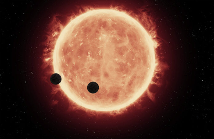 Tranzit exoplanet TRAPPIST-1b a TRAPPIST-1c (kresba). Credit: NASA, ESA, and G. Bacon (STScI)
