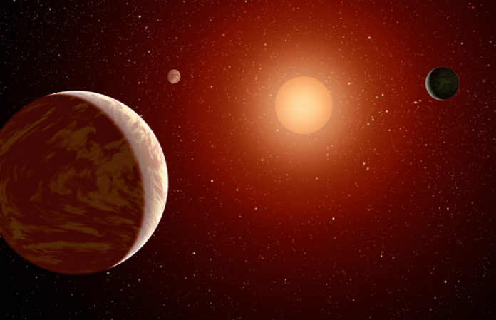 Exoplanety u červeného trpaslíka. Credit: NASA