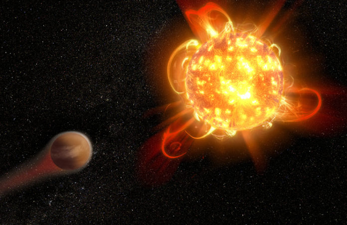 Erupce u červeného trpaslíka s exoplanetou. Credit: NASA, ESA, and D. Player (STScI)