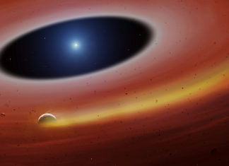 Bilého trpaslíka obíhá obří kus kovu. Jednou za 123 minut! Disk v okolí bílého trpaslíka SDSS J122859.93+104032.9 Credit: University of Warwick/Mark Garlick